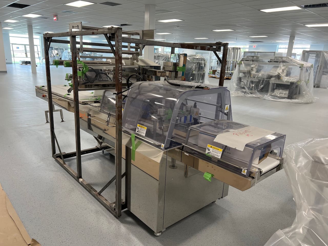 Unused 2021 Fuji Machinery FW3410/B Alpha 8 Continuous Flow Wrapper, Left & Right Side Feed. Includes 2021 Markem Imaje SmartDate X65 Thermal Transfer Printer (New in Box)